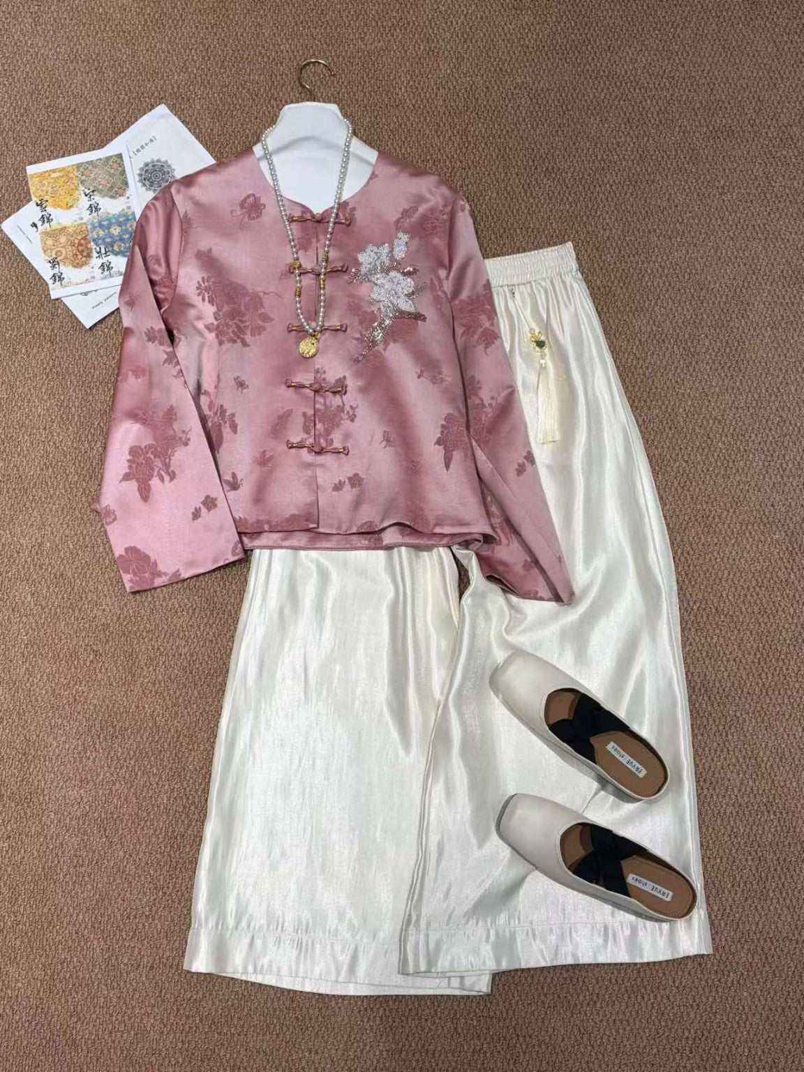 Rose pink Chinese-style jacquard jacket styled with white pants - actual product