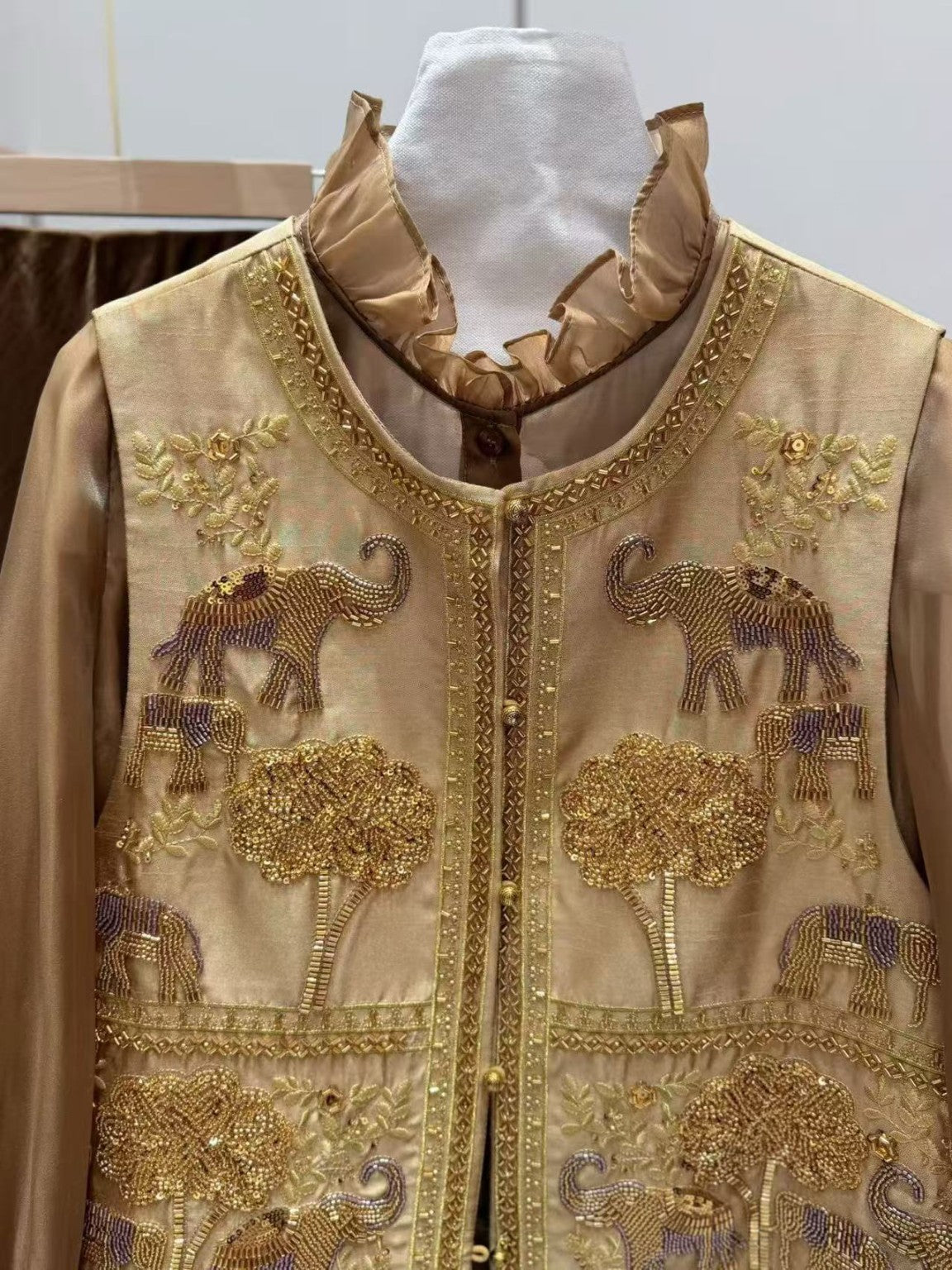 Taupe embroidered vest, front view